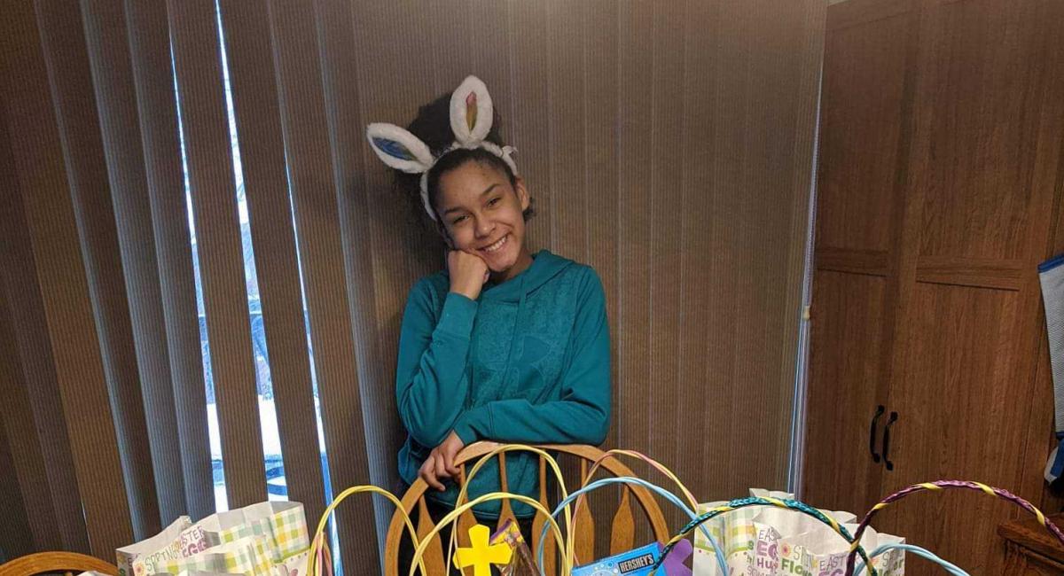 Jaydn poses with Easter baskets she made.
