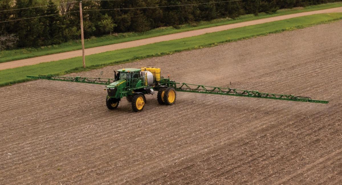 Graphic image of crop sprayer in field near powerlines under "Take the Time. Every Time." header